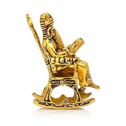 Golden Lord Ganesha Statue Sitting On A Rocking Chair